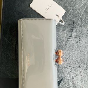 New with defects: ted baker wallet with rose gold snap closure in gray